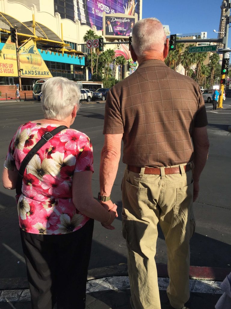 Marilyn, John walking the streets of Vegas